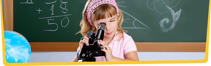 Girl looking in microscope